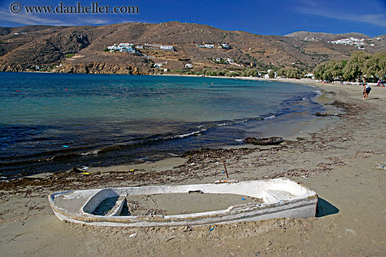 buried-white-boat-in-sand.jpg