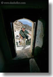 amorgos, archways, doors, europe, greece, hozoviotissa monastery, looking, out, structures, vertical, white wash, photograph