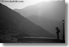 amorgos, black and white, europe, greece, horizontal, lamp posts, mountains, people, photographers, photograph