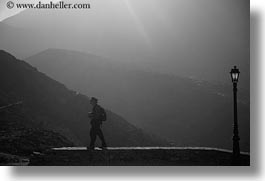 amorgos, black and white, europe, greece, horizontal, lamp posts, mountains, people, photographers, photograph