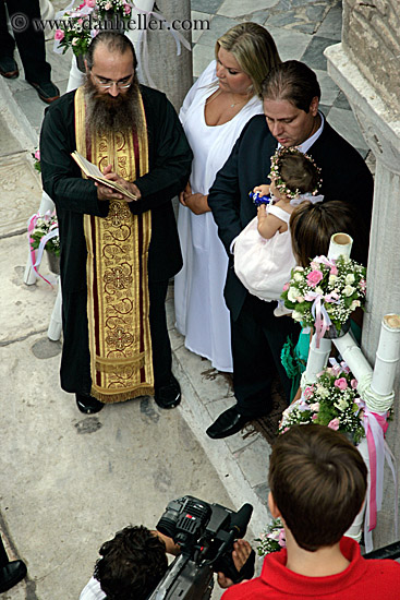 priest-parents-n-baby-1.jpg