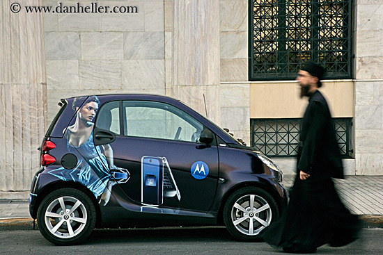 priest-walking-by-motorola-smart-car.jpg