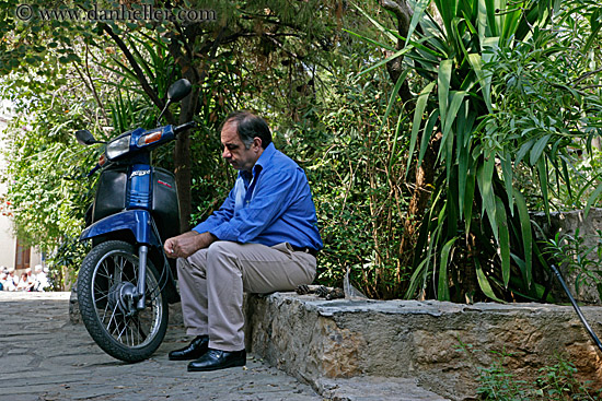 sad-man-n-blue-moped.jpg