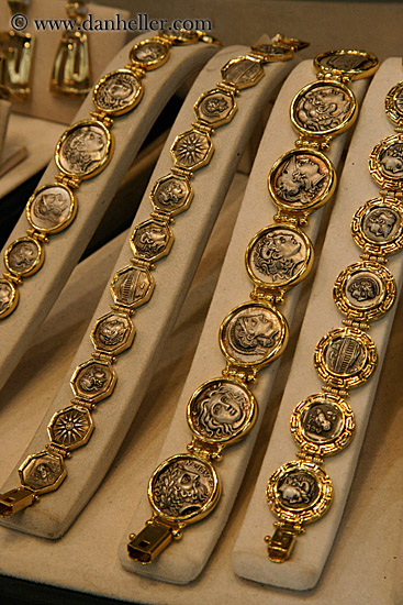 greek-heads-on-gold-jewelry.jpg