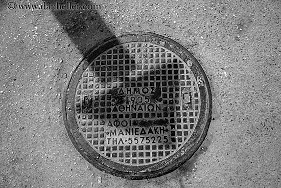 manhole-cover-n-arrow-shadow-bw.jpg