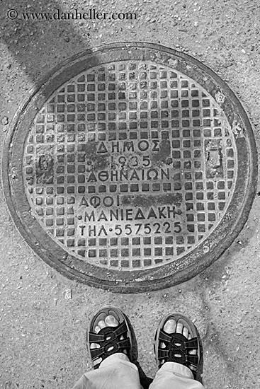 manhole-cover-n-feet-bw.jpg