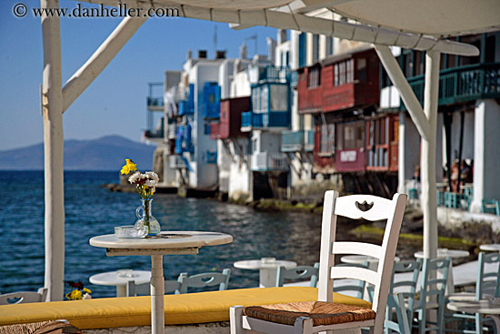 chair-table-flowers-w-waterfront-bldgs.jpg