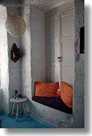 europe, greece, mykonos, oranges, pillows, seats, vertical, white wash, windows, photograph