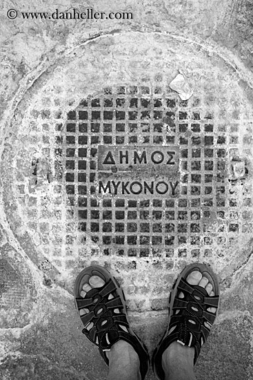 mykonos-manhole-cover-w-feet-bw.jpg