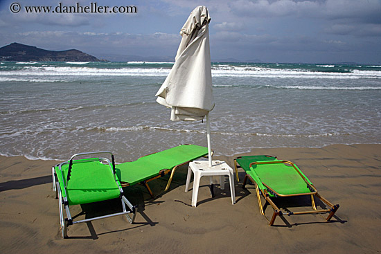 green-chaise-chairs-on-beach-w-ocean-1.jpg