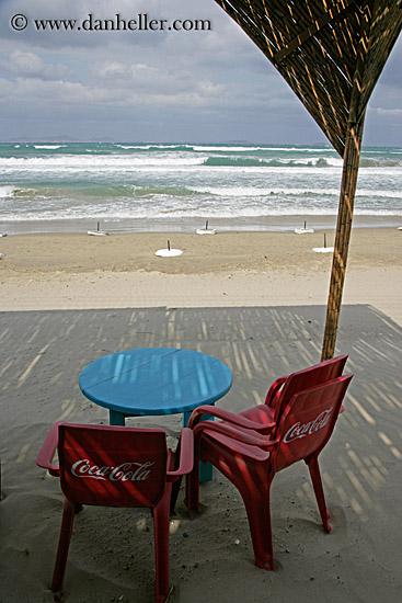 red-coca_cola-chairs-w-blue-table-on-beach.jpg