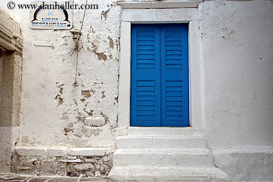 Blue Shutters Steps and Dolphin Sign