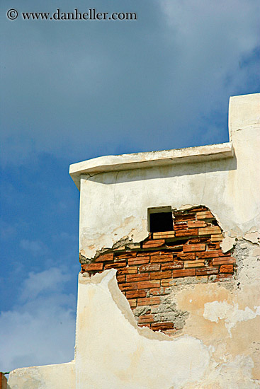 tiny-window-n-exposed-bricks.jpg