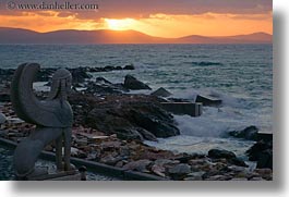 europe, greece, horizontal, naxos, ocean, statues, sunsets, winged, photograph