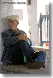 clothes, emotions, europe, glasses, greece, hats, men, naxos, old, people, serious, sitting, vertical, watching, photograph