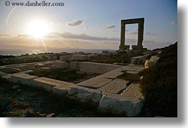 apollo, arches, architectural ruins, buildings, clouds, europe, greece, horizontal, nature, naxos, ocean, silhouettes, sky, structures, sun, sunsets, temple of apollo, photograph