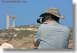 arches, architectural ruins, buildings, clothes, europe, greece, hats, horizontal, men, naxos, photographing, structures, temple of apollo, photograph