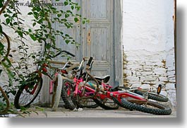 bicycles, colors, doors, europe, greece, horizontal, naxos, red, vehicles, photograph