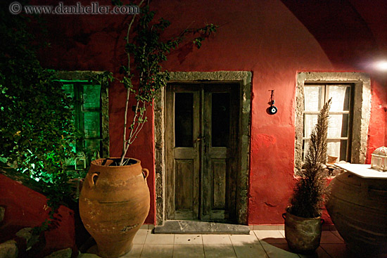 wood-door-red-wall-n-potted-tree-1.jpg