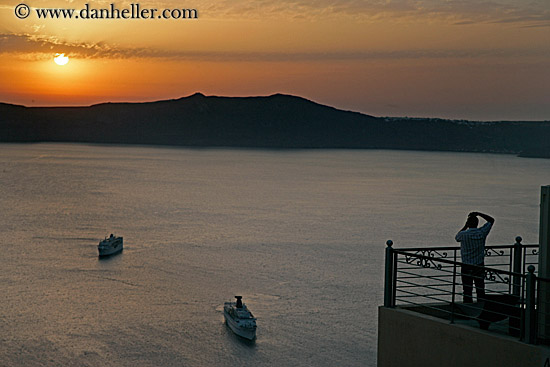 man-photographing-sunset-w-cruise-ships.jpg