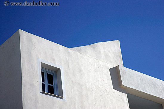 white_wash-bldg-w-blue-window-n-sky.jpg