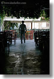 chairs, europe, greece, men, people, silhouettes, tinos, vertical, walking, photograph