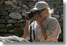 artists, blonds, cameras, carol, clothes, emotions, europe, greece, happy, hats, horizontal, people, photographers, senior citizen, smiles, sunglasses, tourists, womens, photograph