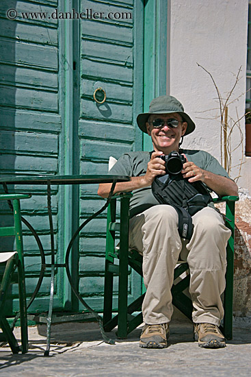 howard-w-camera-in-green-chair-2.jpg