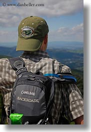 backpack, baseball cap, clothes, clouds, europe, groups, hats, hikers, hungary, landscapes, looking, men, nature, over, people, ron seely, sky, tour guides, vertical, photograph