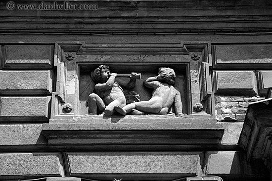 cherub-blowing-horn-stone-relief-bw.jpg