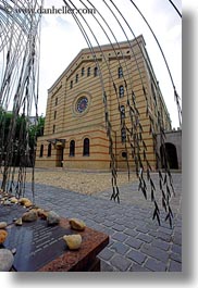 bricks, budapest, buildings, europe, hungary, jewish, leaves, materials, religious, steel, synagogue, vertical, photograph