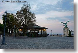 bronze, budapest, buildings, castle hill, eagles, europe, glasses, horizontal, hungary, materials, statues, photograph