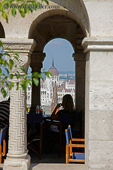 woman-viewing-cityscape-thru-archway-1.jpg