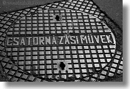 black and white, budapest, covers, europe, horizontal, hungary, irons, manhole covers, manholes, materials, photograph