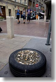 budapest, butts, cigarettes, europe, hungary, tires, vertical, photograph