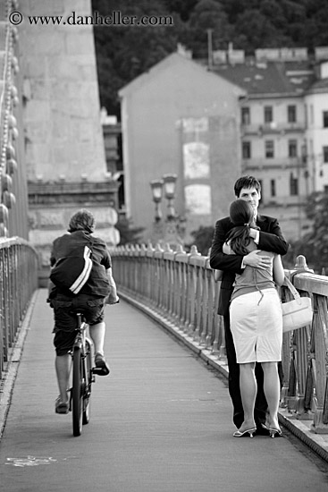 couple-hungging-n-cyclist-bw.jpg