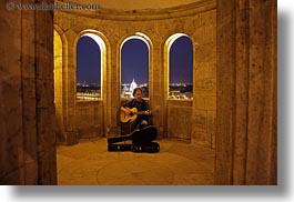 archways, artists, budapest, europe, guitars, horizontal, hungary, instruments, men, music, musicians, nite, people, players, slow exposure, windows, photograph