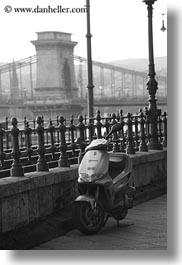 black and white, bridge, budapest, europe, hungary, motorcycles, structures, szechenyi chain bridge, towers, vertical, photograph
