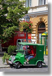 budapest, europe, green, hungary, men, people, postal, transportation, trucks, vertical, photograph