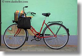 bicycles, bikes, europe, green, horizontal, hungary, red, tarcal, walls, photograph