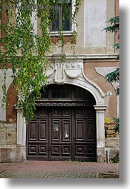 buildings, doors, europe, hungary, leaves, ornate, tarcal, vertical, photograph