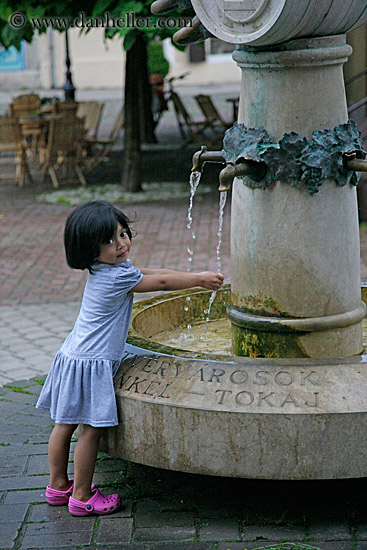 little-girl-washing-hands-in-fountain-water-1.jpg