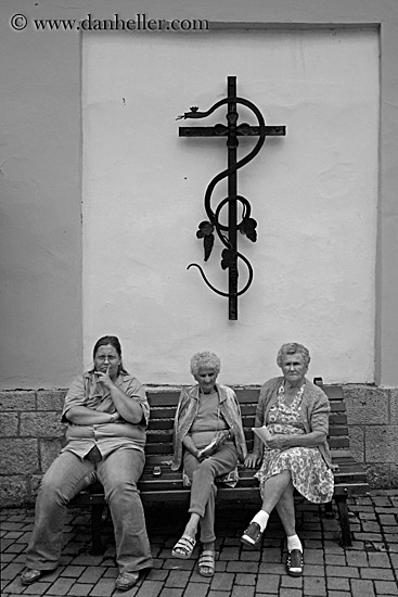old-women-on-bench-under-cross-bw.jpg