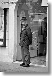 black and white, bolzano, dolomites, europe, grouchy, italy, men, people, vertical, photograph