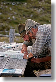 alto adige, dolomites, europe, italy, ladin, map, men, people, reading, vertical, photograph