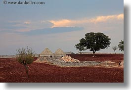 alberobello, buildings, europe, farm house, fences, horizontal, italy, puglia, stones, structures, trullis, photograph