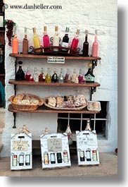 alberobello, bottles, colorful, europe, italy, puglia, vertical, wines, photograph