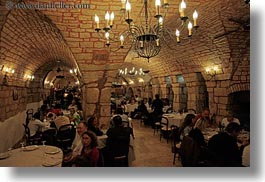 alberobello, archways, eating, europe, horizontal, italy, people, puglia, restaurants, structures, photograph
