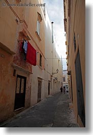 europe, gallipoli, italy, laundry, puglia, red, vertical, photograph