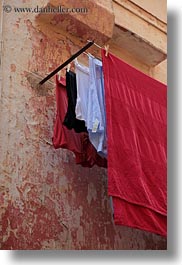 europe, gallipoli, italy, laundry, puglia, red, vertical, photograph